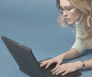 Can Sealgar help with your IT problems? A concerned girl looking at a laptop